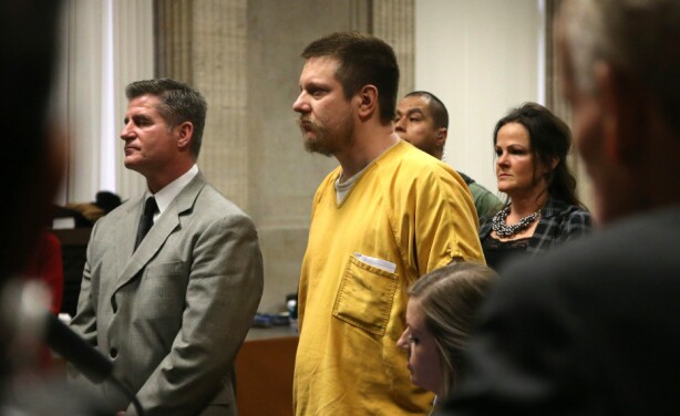 Former Chicago police Officer Jason Van Dyke (C) and his attorney Daniel Herbert attend Van Dyke's sentencing hearing at the Leighton Criminal Court Building on January 18, 2019, in Chicago. - Van Dyke is to be sentenced Friday for the fatal shooting of McDonald, and African-American 17-year-old, in 2014. (Photo by Antonio Perez / POOL / AFP)